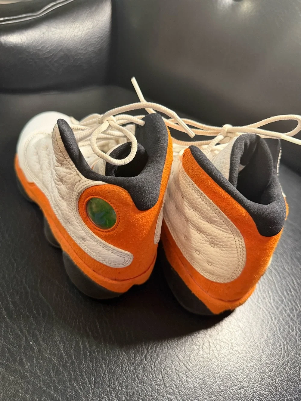 Jordan Black and Orange Low-Top Sneakers